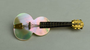 Item # 2, CONTINENTAL STYLE GUITAR PIN WITH MOTHER OF PEARL GUITAR