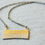 Thumbnail: Textured Gold and Silver Necklace