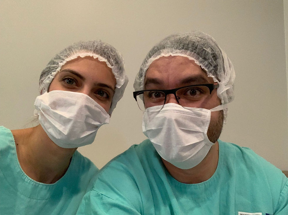 Doula and partner during c-section
