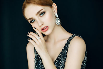 woman wearing large earrings