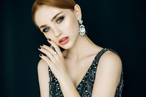 woman wearing large earrings