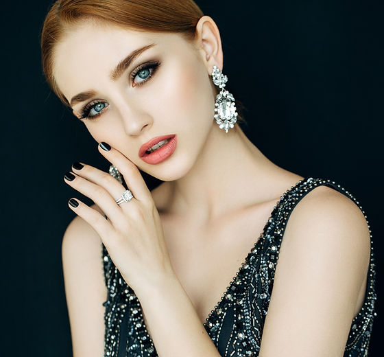 woman wearing large earrings