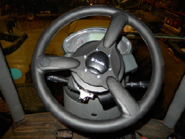 Trimble EZ-Pilot Pro steering wheel installed in cab.