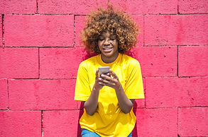 woman-in-yellow-shirt-holding-cellular-p