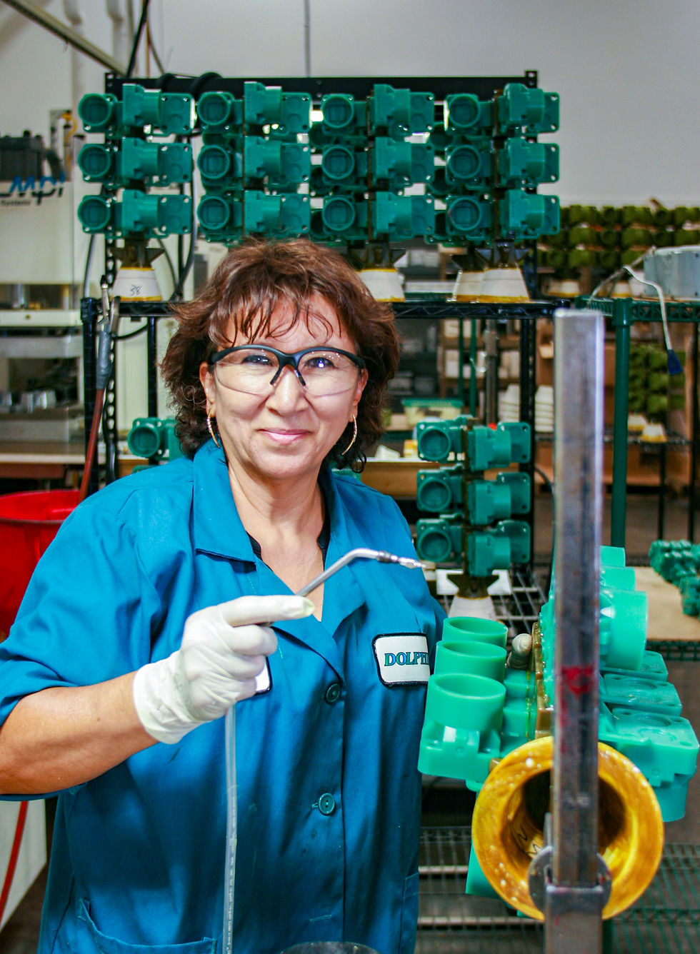 Smiling Employee cleaning our castings