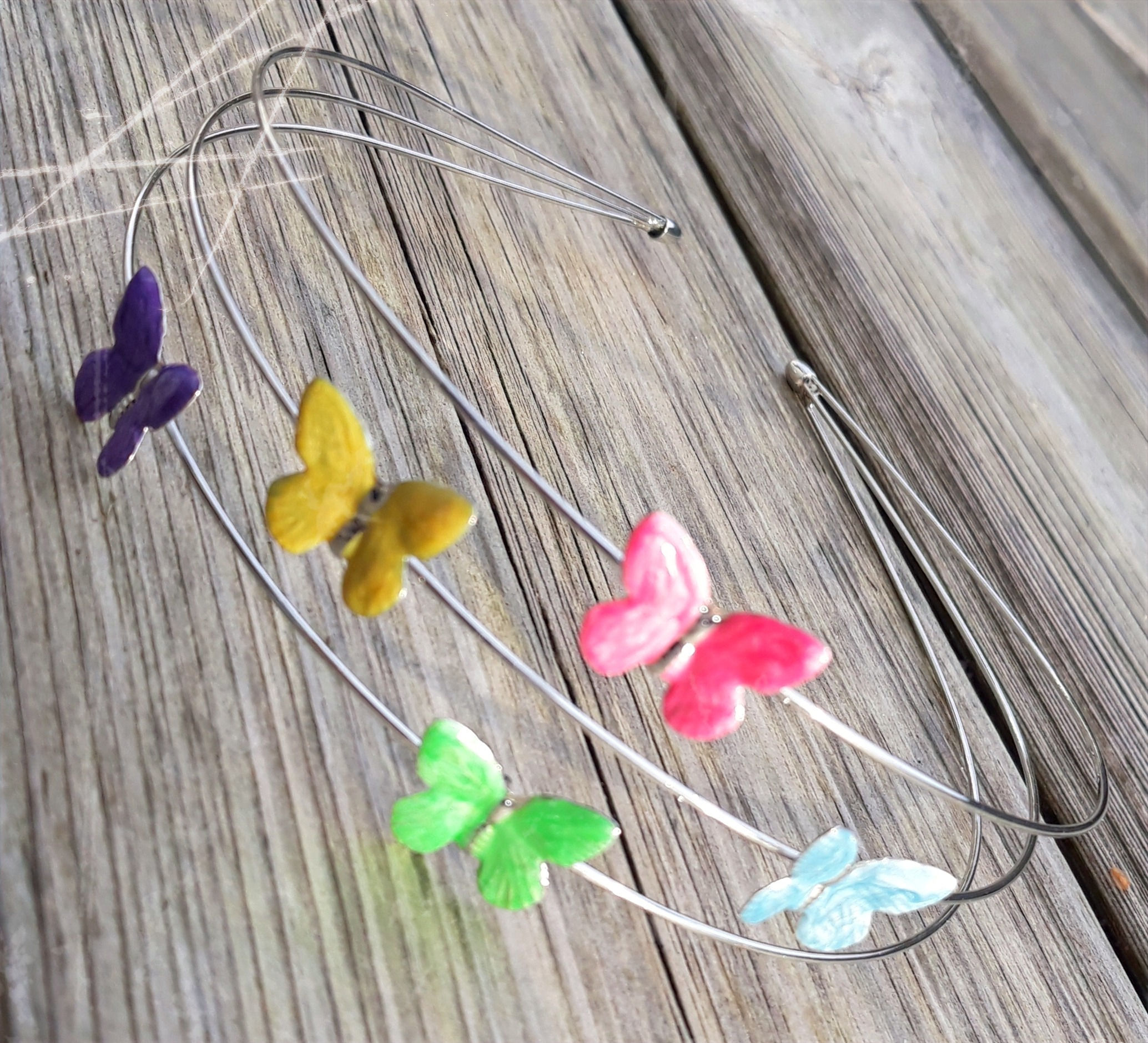 serre tete fille papillons metal