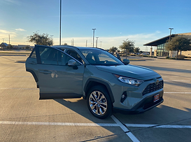 2021 Toyota RAV4 available for rent at Algia Motors, featuring premium leather seats and a sleek design for a comfortable and