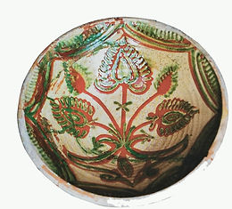 Découvrez la "Terrine au bouquet avec épis de blé", une pièce de poterie traditionnelle qui allie élégance et authenticité. Ce magnifique objet d'artisanat, orné de motifs floraux et d'épis de blé, est un véritable hommage à la nature et au savoir-faire local. Explorez les détails de cette terrine unique sur mon site https://vilarsclaude.wixsite.com/normandie. Partagez cette découverte avec les hashtags #TerrineAuBouquet #PoterieTraditionnelle #ÉpisDeBlé #ArtisanatLocal #Normandie.