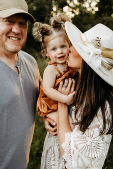 mom kissing baby cute hat
