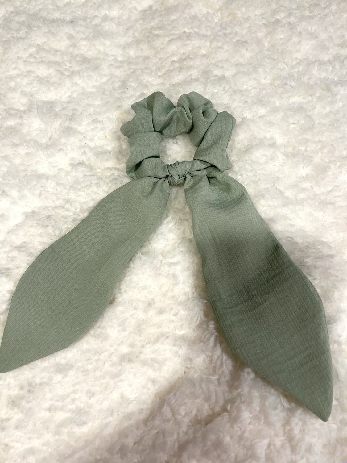 Pistachio green with long rabbit ears