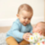 baby interacting with a baby.jpg