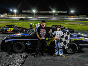 MENARD HOLDS ON FOR IMPRESSIVE PURE STOCK WIN