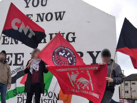 La Suiza 6 Solidarity Action at Free Derry Wall