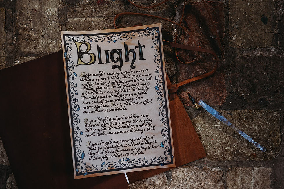 Thumbnail: Old parchment titled Blight with text illustration, on a wooden surface.