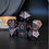 Thumbnail: Black dice set with rose gold  numbers made with Jesmonite, on a dark background
