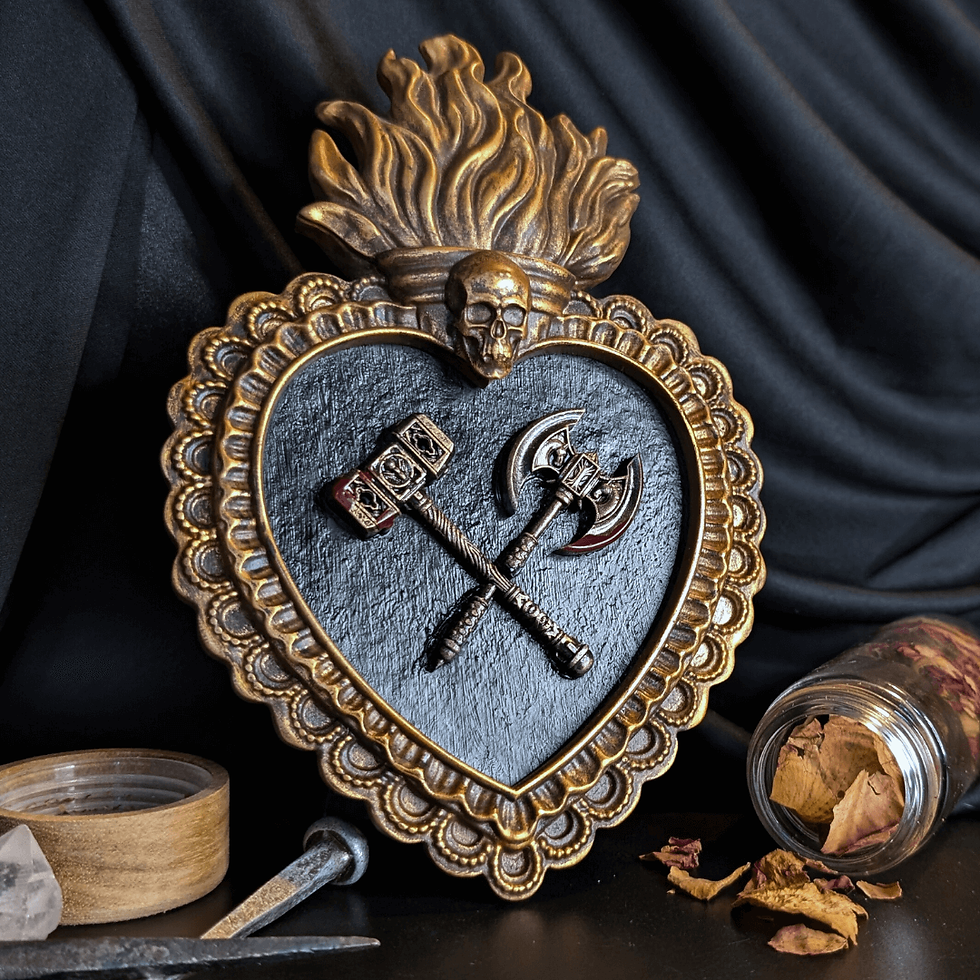 Ornate heart decor with crossed hammer and axe on black background. Roll Gothica.