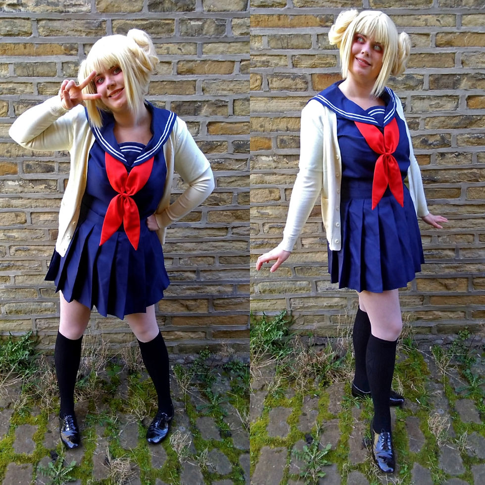Misty Moon Illustrations cosplaying Himiko Toga frmo My Hero Academia, stood in front of a wall outdoors.
