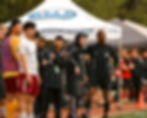Soccer referee signaling on field to learn soccer referee rules