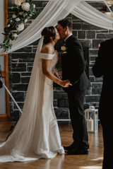 bride and groom share first kiss at cardiff wedding