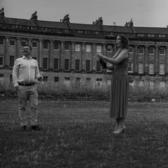 Surprise proposal photography – Emily’s reaction captured candidly