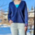 Little colour heart details on the sleeve of a Lisa Todd cardigan are stylish and very cheerful. Navy is a winning colour for spring and summer.