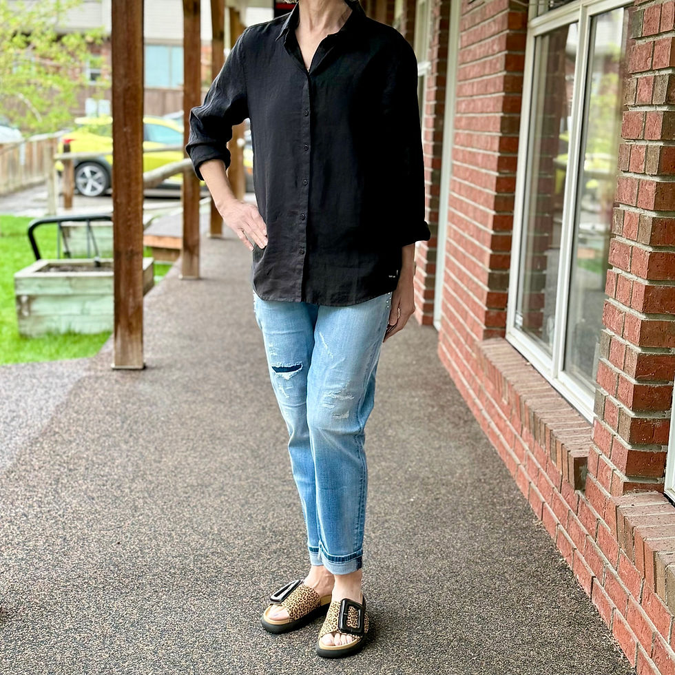 A linen shirt with rolled sleeves creates laid-back yet stylish outfits for casual occasions.