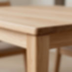 Close-up of light wooden table corner