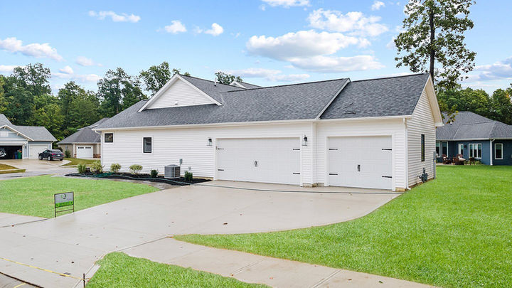 3 Car Garage - Custom Home - Quality Crafted Homes - Model Home - Side Load Garage - Fort Wayne Indiana