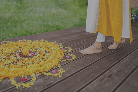 Feet pointing towards petal mandala