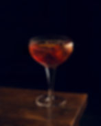 Cocktail on black background.