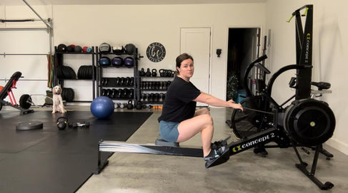 wide knees on return of rowing pull