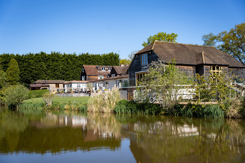 Barn wedding and events venue in West Sussex, featuring Amy and Caspar’s joyful celebration at Brookfield Barn, with stunning countryside views providing the perfect backdrop for an outdoor wedding.