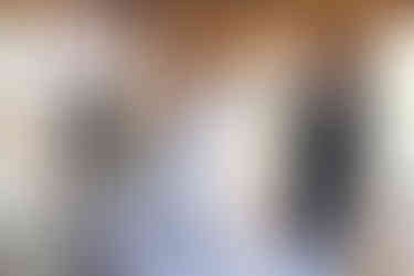 Guests enjoying heartfelt speeches during the wedding reception at Brookfield Barn, with family and friends sharing touching moments.