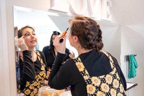 Bride getting ready at Brookfield Barn, preparing for her wedding day with a focus on the final touches of her bridal look.