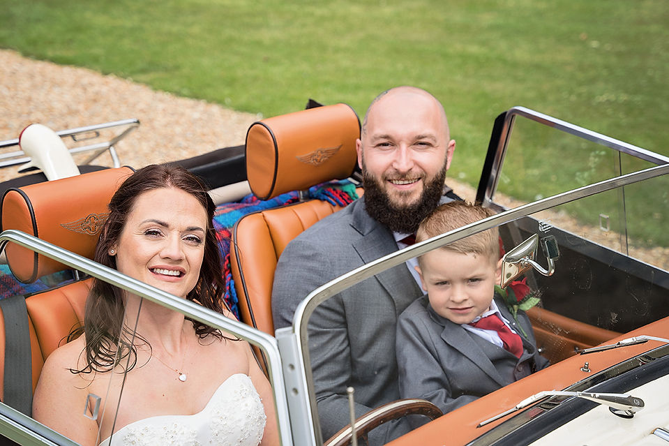Amberly Castle Wedding Day, West Sussex Photographer, wedding ceremony, small party in the garden, wedding car