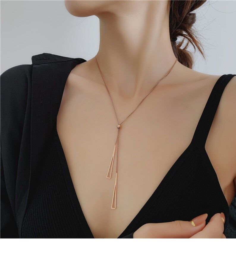 Thumbnail: Gold Geometric Triangle Tassel Pull Necklace