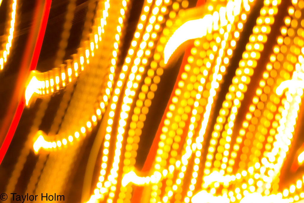 Long exposure photography from New York City. This created light stands of pearls that seem to blow in the wind. 