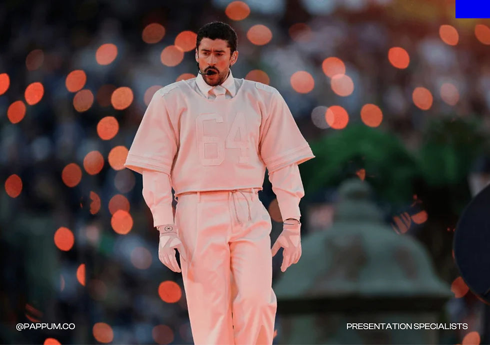 Performer dressed in a monochromatic pastel pink outfit walking through a stadium stage surrounded by warm lights and a cheering crowd. Large-scale live event showcasing visual storytelling, performance design and audience engagement.