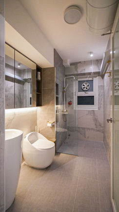Modern bathroom with custom LED lighting cabinets.