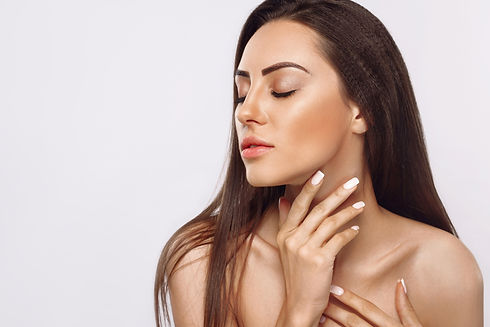 Woman with beauty face touching healthy facial skin portrait