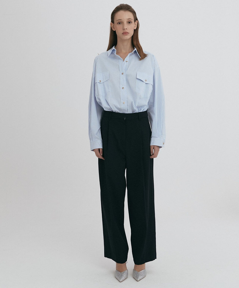 Thumbnail: A blue and white oversized button-down striped shirt.