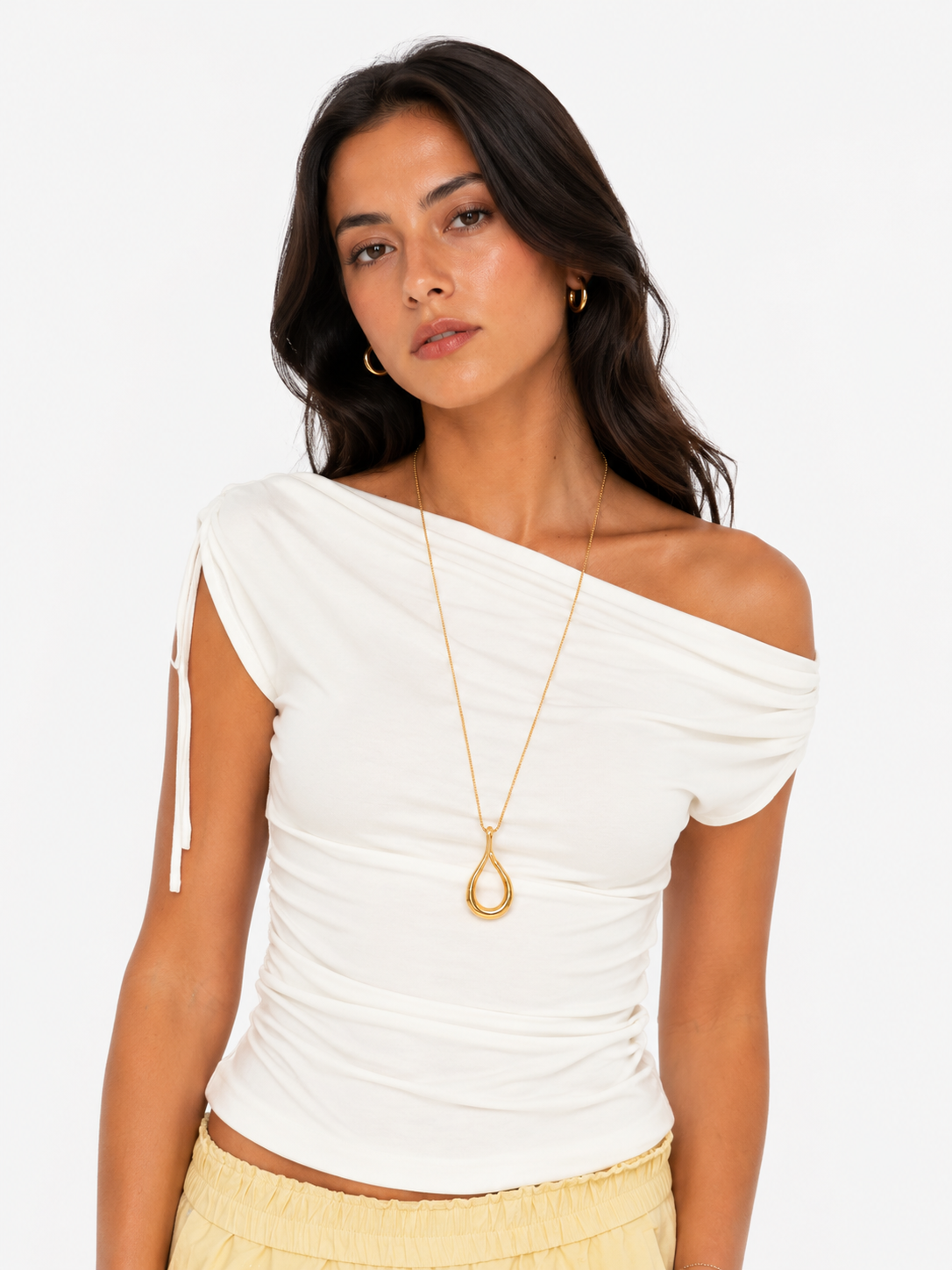 Sienna Off-Shoulder Ruched Top in Cream with removable shoulder tie, soft stretch fabric, and flattering fitted silhouette.
