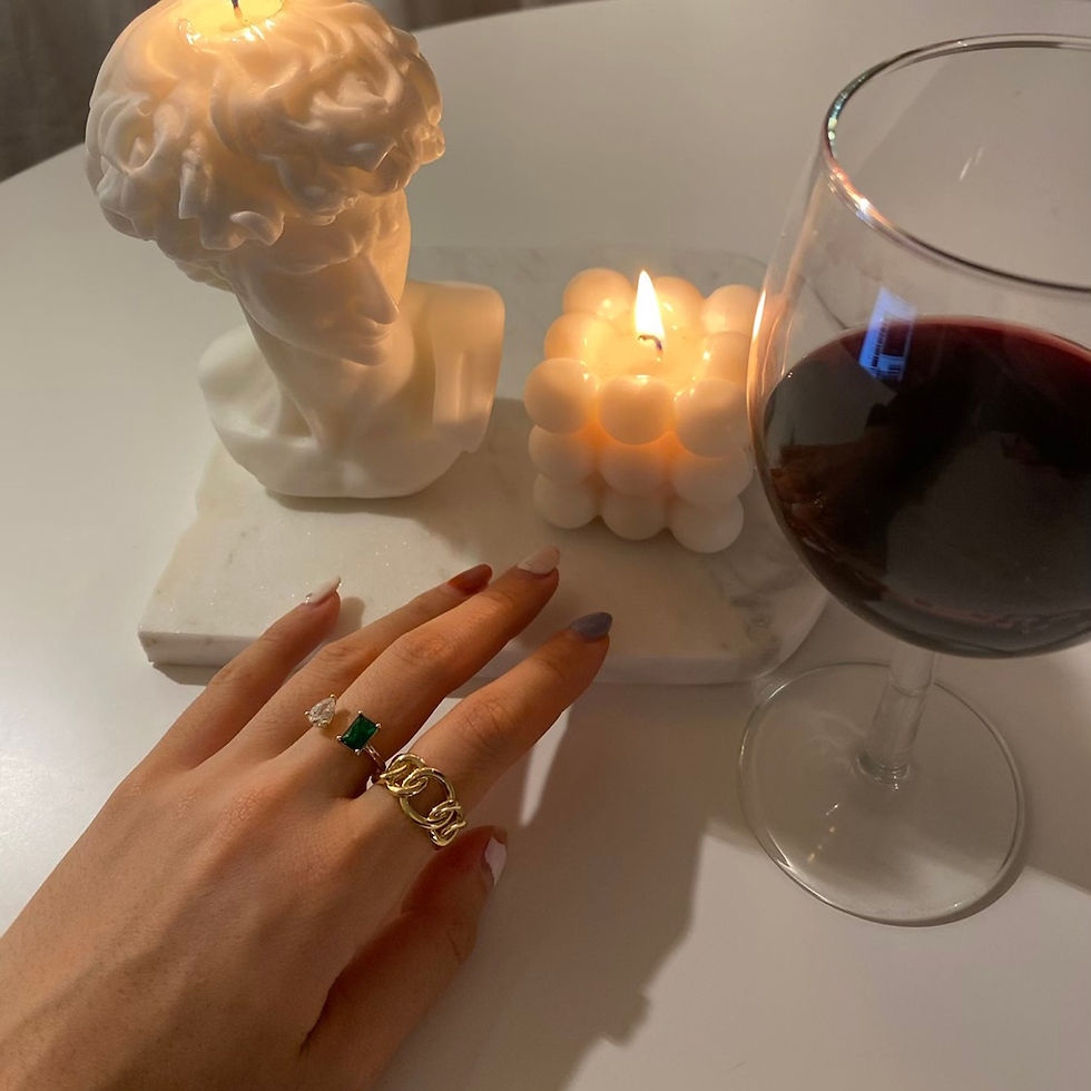 Thumbnail: Close-up of hands layering gold rings, highlighting the Emerald Stone Point Open Ring as a statement piece