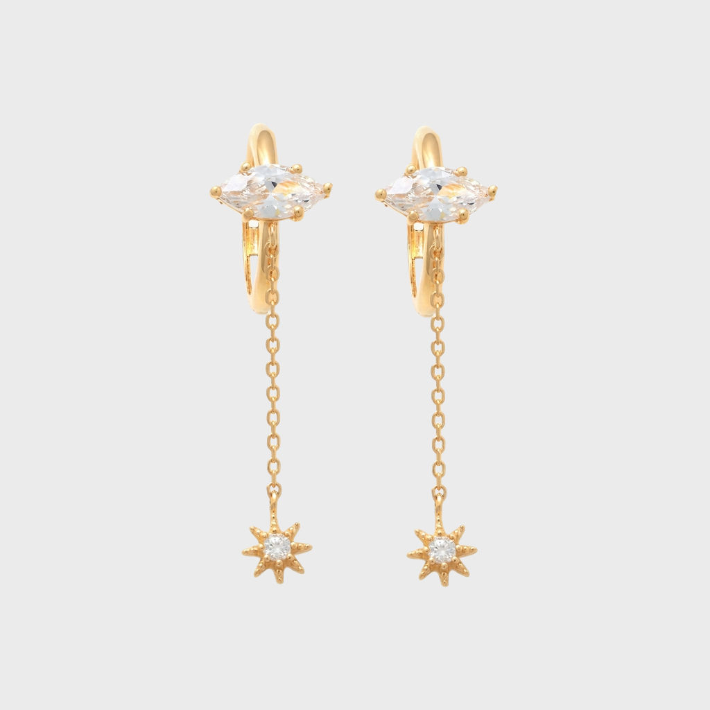 14k solid gold hoop earrings featuring a marquise cut stone, a dangling fine chain, and a small sunburst charm