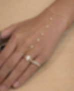 dainty gold hand chain bracelet minimal gold hand chain jewelry oval and round stone hand chain