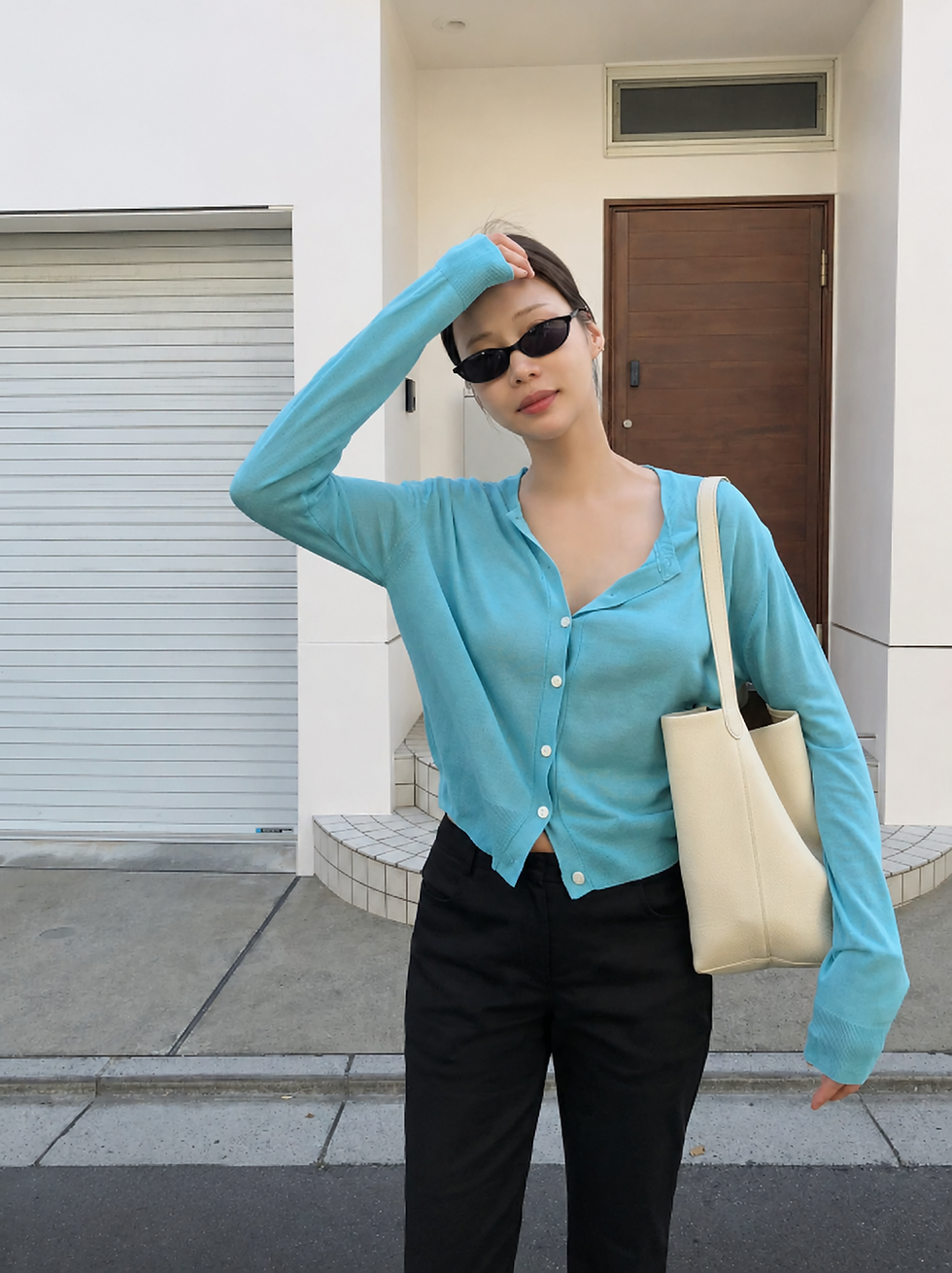 Thumbnail: Sky-blue summer cardigan street style model wearing with stone necklace