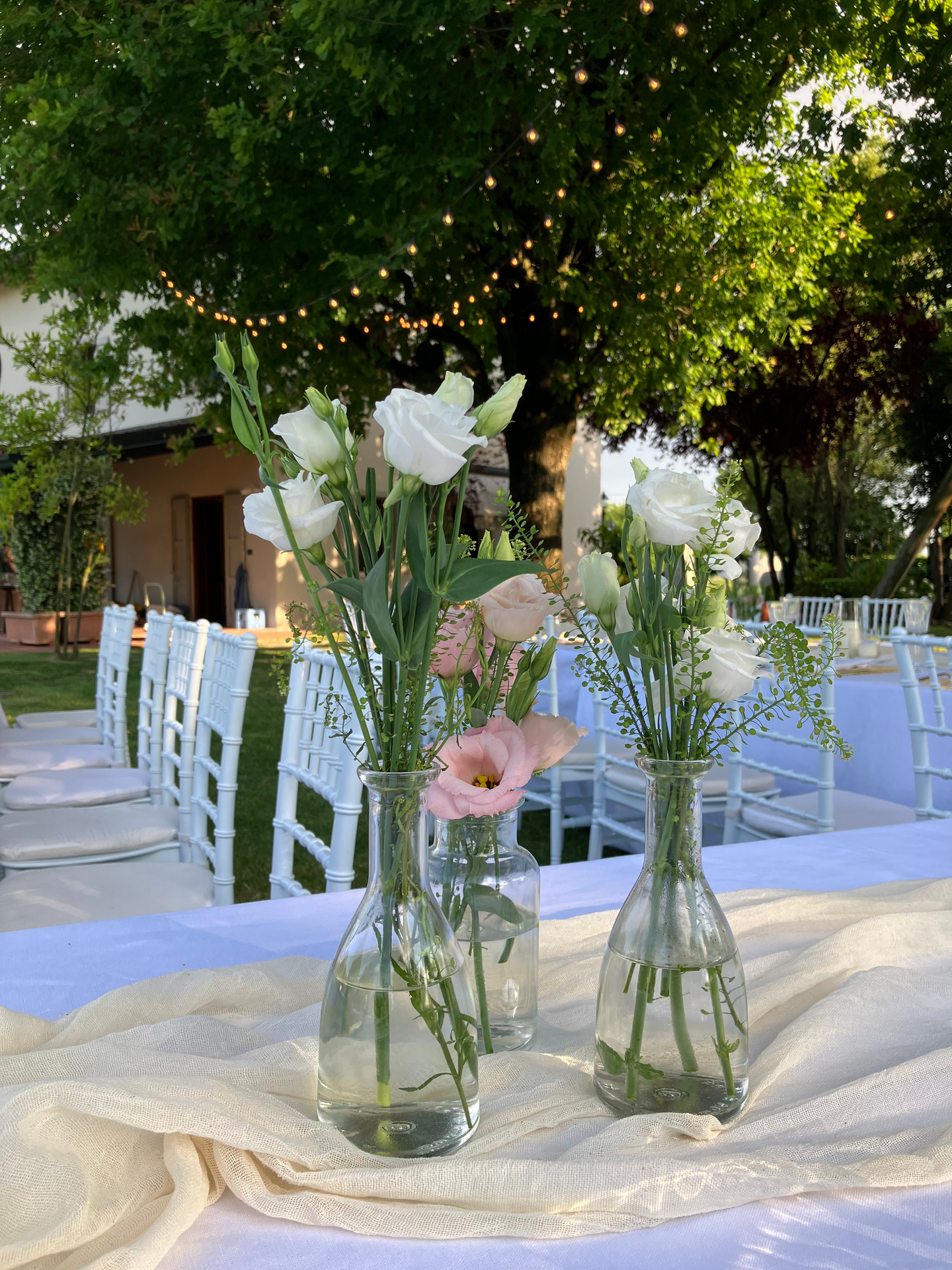 Gender reveal party, detail of vases with centerpiece flowers