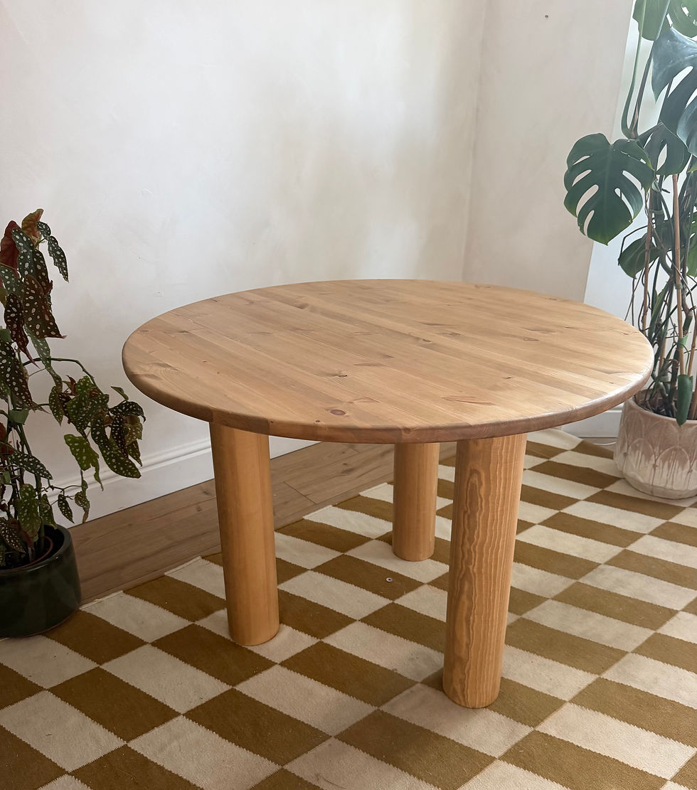 Thumbnail: Round dining table with 3 chunky legs 
