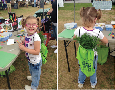 A young girl proudly showcases fresh vegetables in her Maine SNAP-Ed backpack at a Rockland farmers’ market event.