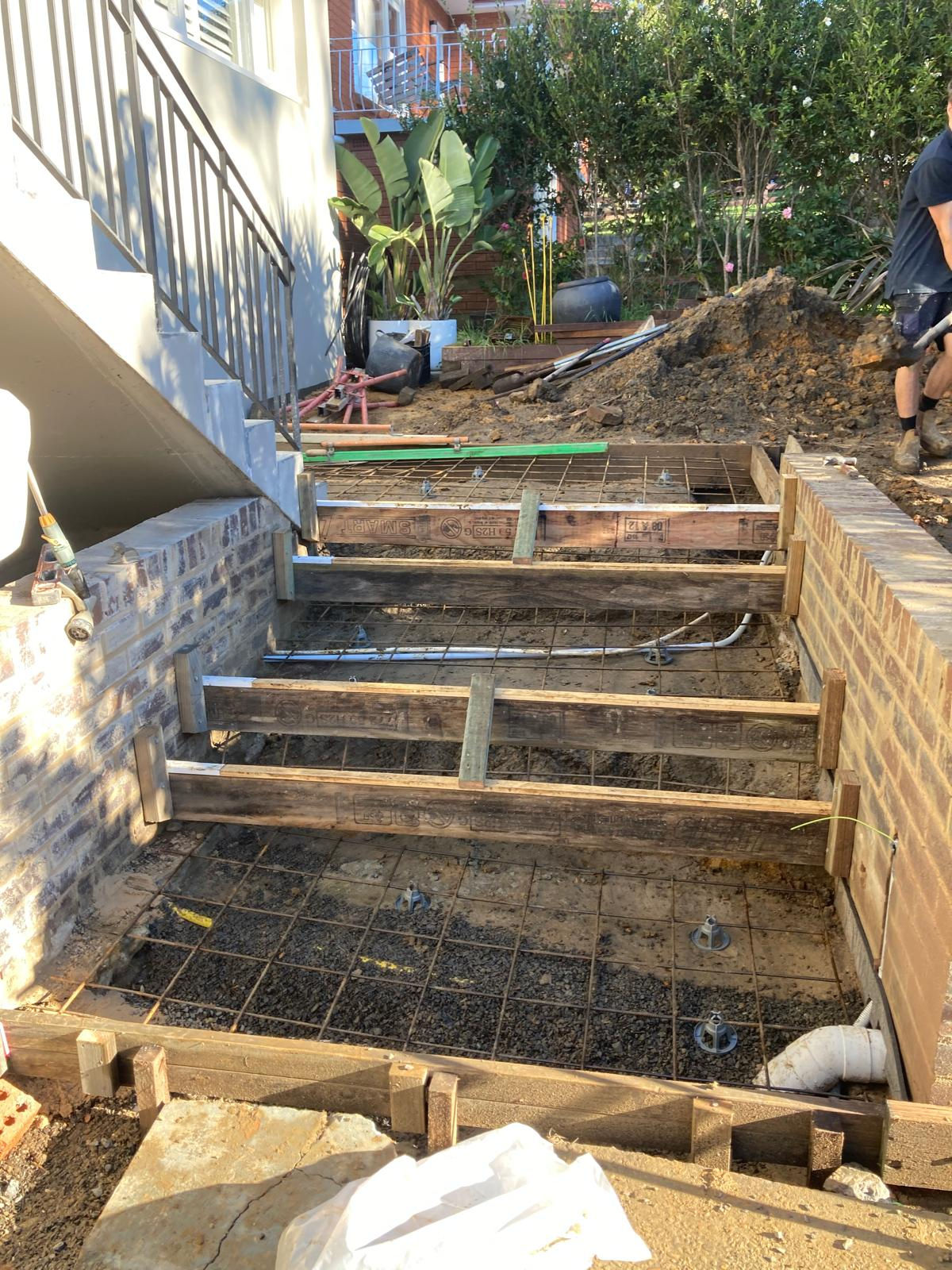 Structural staircase preparation for crazy paving at a Mona Vale home